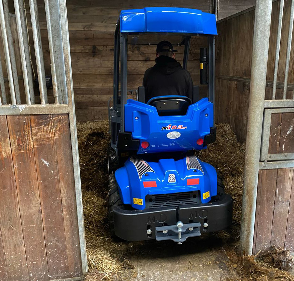 MultiOne mini loader 2 series inside a stable, rear view