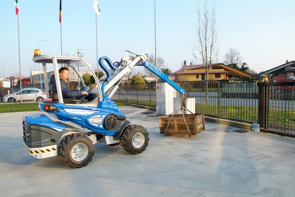jib crane moving a wooden box