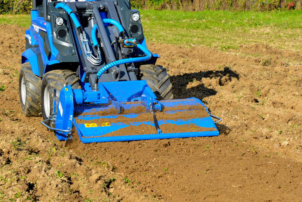 detail of the work of a rotary tiller on a soil surface