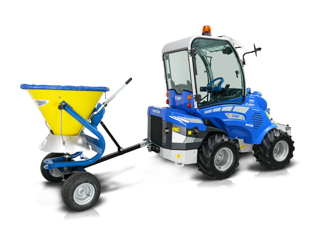salt and sand spreader linked to a mini loader with a two wheels cart